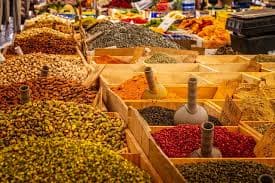 A vibrant market scene with various exotic foods